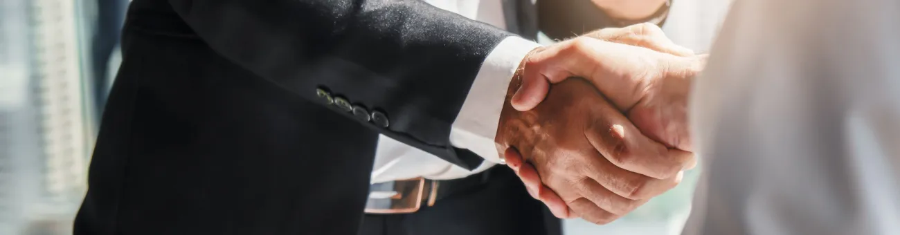 Business people shaking hands